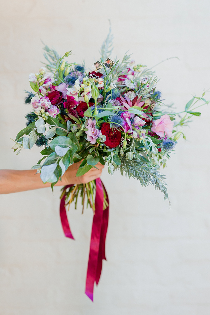 Photo Of Person Holding Bouquet